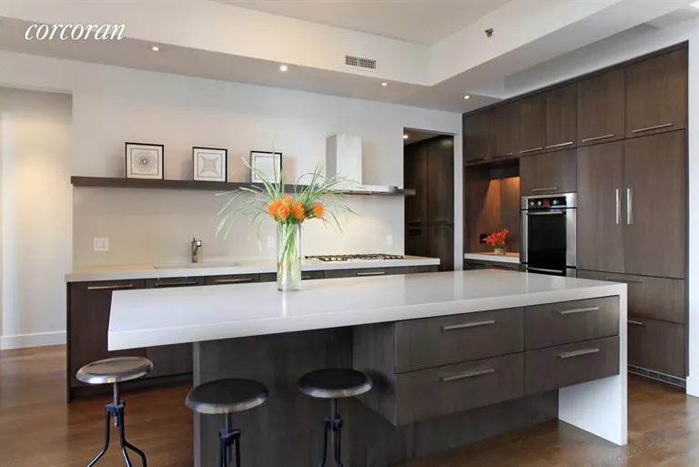 New York City Real Estate | View 316 East 22nd Street, PH1 | A Grand Scale Island Graces the Custom Kitchen | View 5