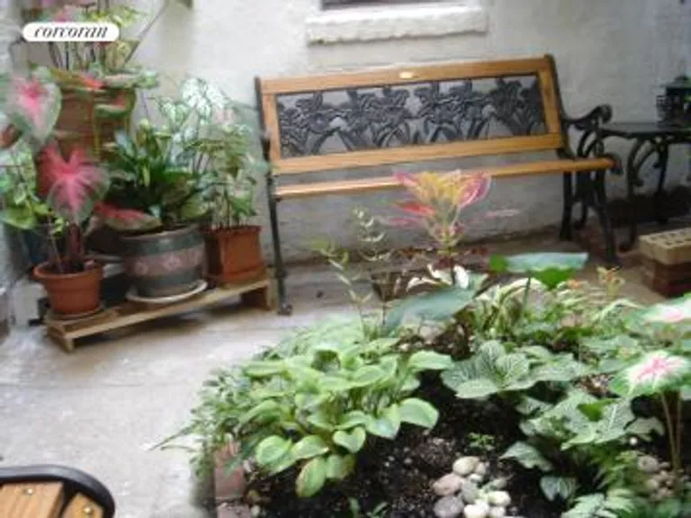 New York City Real Estate | View 277 Hicks Street, 1B | Courtyard in bloom | View 5