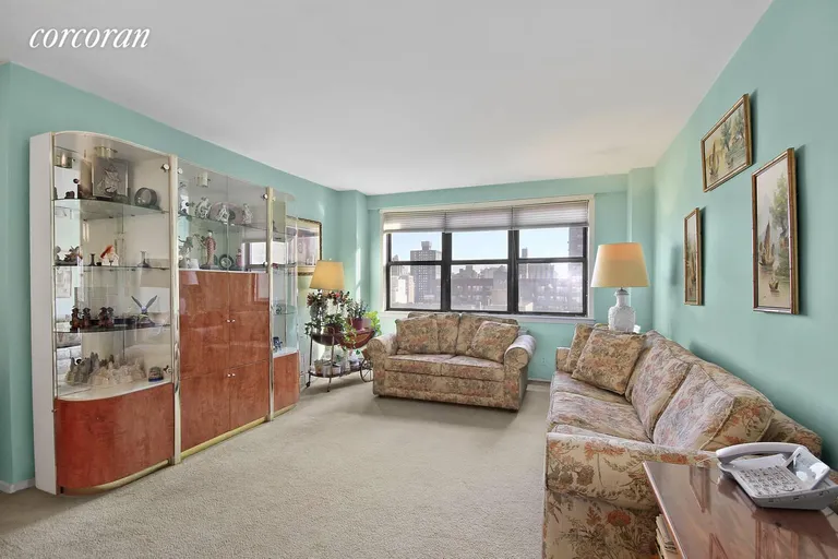 New York City Real Estate | View 201 East 28th Street, 14F | Huge living room with open city views. | View 3