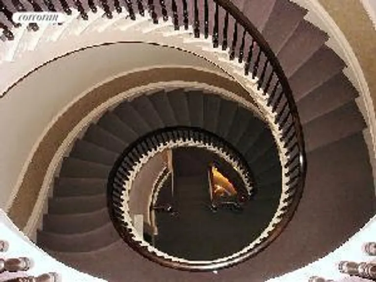 New York City Real Estate | View 108 Pierrepont Street, 6 | Dramatic Spiral Central Stairwell | View 2