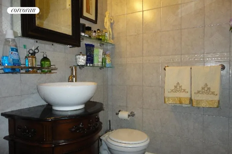 New York City Real Estate | View 122 Ashland Place, 11E | Bathroom with Tub and Dressing Area | View 4