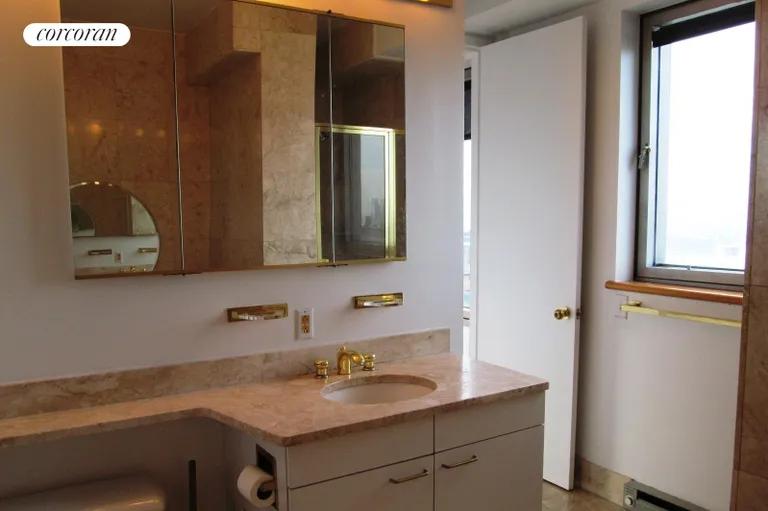 New York City Real Estate | View 301 West 57th Street, 49A | Windowed bathroom | View 9