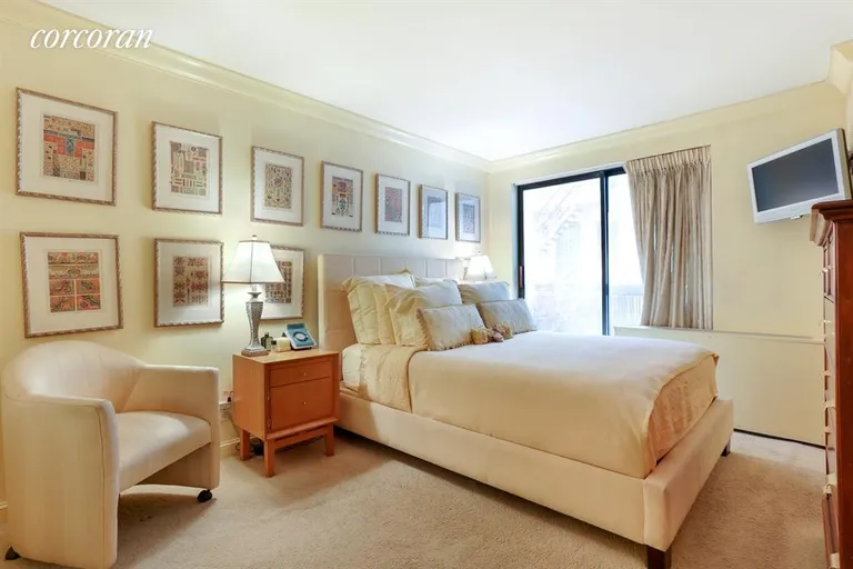 New York City Real Estate | View 7 East 35th Street, 6B | Spacious bedroom with terrace and en suite bath | View 5