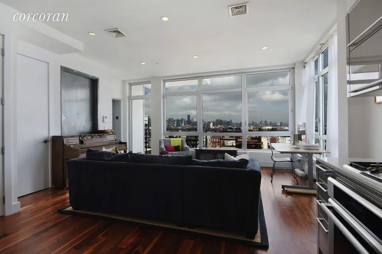 New York City Real Estate | View 84 Engert Avenue, 7A | Living Room - Reverse | View 2