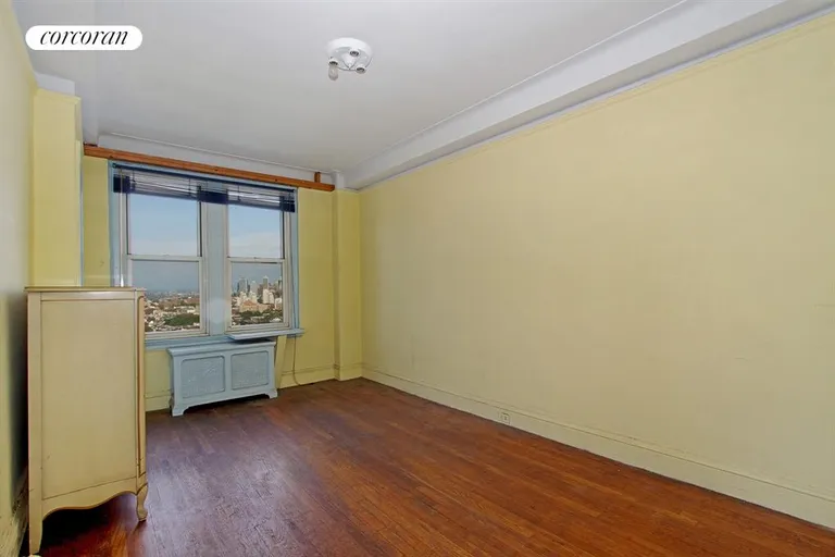 New York City Real Estate | View 39 Plaza Street West, 10C | Master Bedroom w/ En Suite Bath & Manhattan Views | View 2
