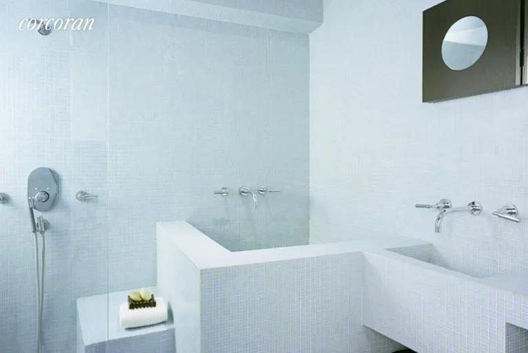 New York City Real Estate | View 67 East 11th Street, 417 | Spa Like Bisazza  shower and Soak tub | View 5