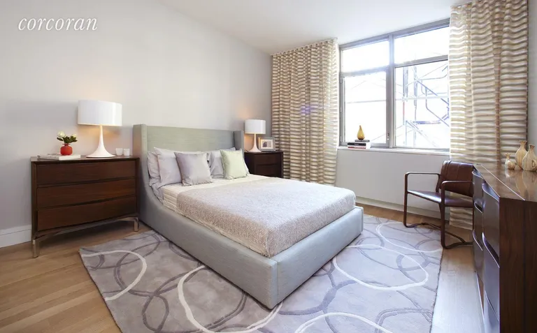 New York City Real Estate | View 124 West 23rd Street, 2A | Master bedroom with ensuite bath | View 6