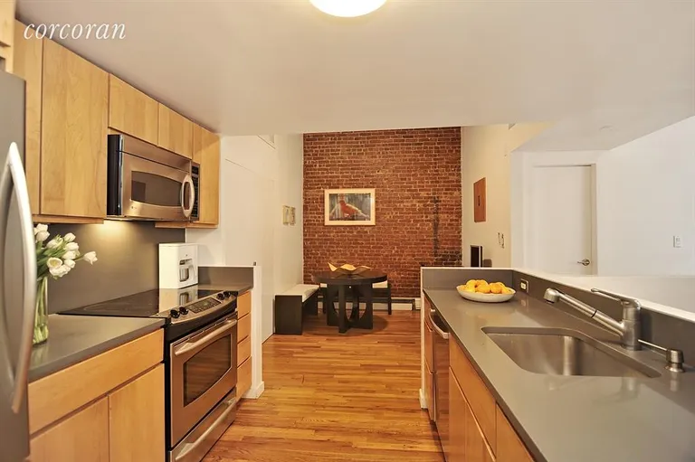 New York City Real Estate | View 302 5th Avenue, 1R | Kitchen and breakfast area plus homework station! | View 3