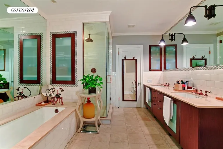 New York City Real Estate | View 65 East 90th Street | Master Bathroom - Rainshower Stall & Soaking Tub | View 5