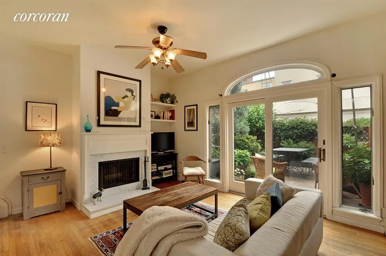 New York City Real Estate | View 126 4th Place, 3 | Living Room with wood burning fireplace | View 2