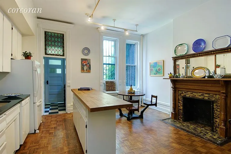 New York City Real Estate | View 163 West 88th Street | Bright open eat-in  kitchen with fireplace | View 3