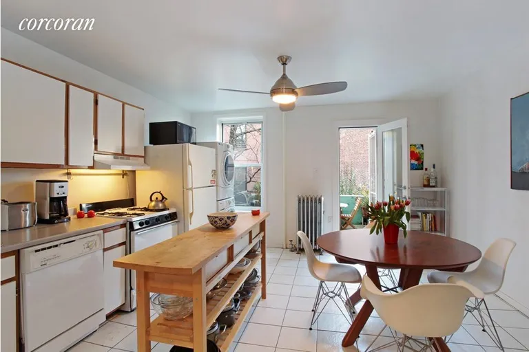 New York City Real Estate | View 494 State Street | Upper duplex kitchen with deck access | View 3