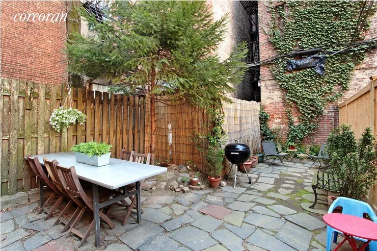 New York City Real Estate | View 494 State Street | Private backyard with alfresco dining | View 9