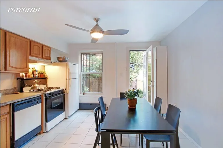 New York City Real Estate | View 494 State Street | Garden kitchen leads directly to garden | View 8