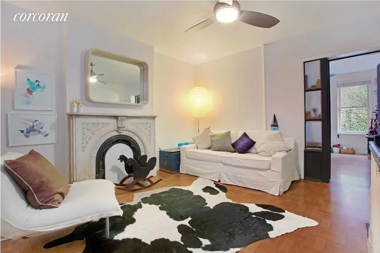 New York City Real Estate | View 494 State Street | Family room with fireplace | View 2
