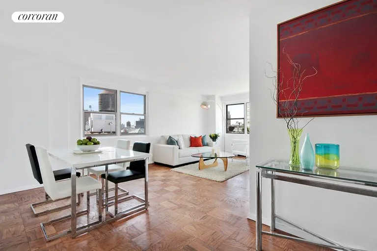 New York City Real Estate | View 77 East 12th Street, 18A | Windowed Dining area and entry table | View 4