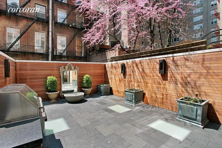 New York City Real Estate | View 150 West 15th Street | Rear yard with gas grill | View 6
