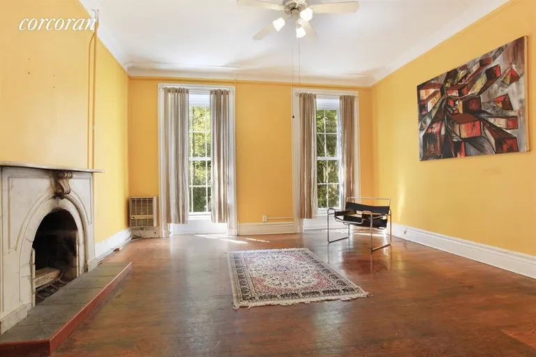 New York City Real Estate | View 295 Warren Street | Living room with floor to ceiling windows | View 2