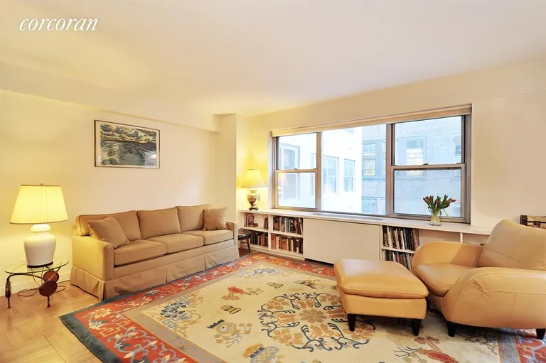New York City Real Estate | View 175 West 13th Street, 4A | Living/sleeping area with built-in bookshelves | View 2
