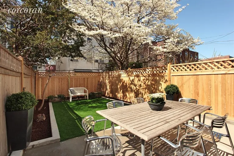 New York City Real Estate | View 151 Seeley Street | We think that's a pear tree! Note New Fence! | View 8