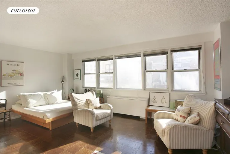 New York City Real Estate | View 77 East 12th Street, 11E | Wall of East Facing Windows | View 8