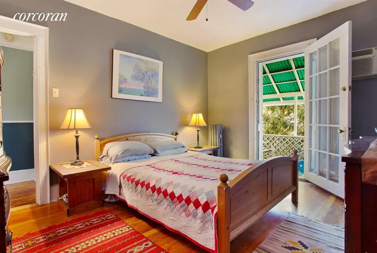 New York City Real Estate | View 556 77th Street | Master Bedroom with covered porch | View 3