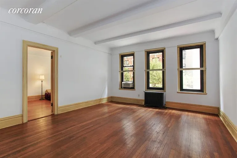 New York City Real Estate | View 255 West End Avenue, 2B | Bright and East facing living room- beamed ceiling | View 2