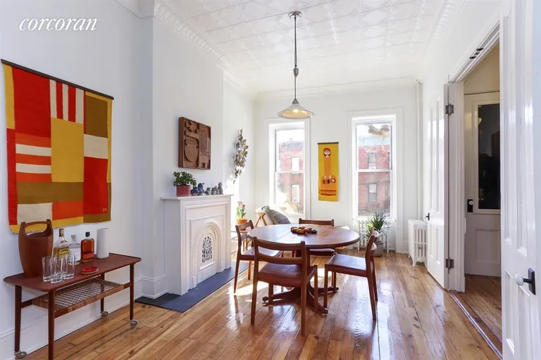 New York City Real Estate | View 505 17th Street | Living room w/ large double doors and tin ceilings | View 2
