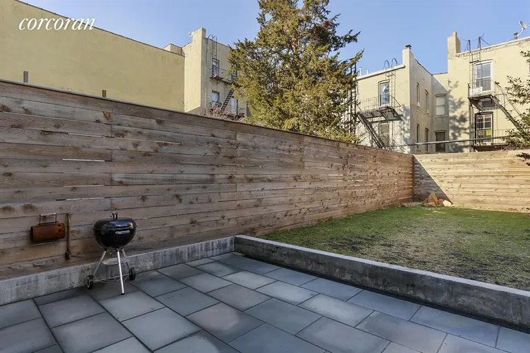 New York City Real Estate | View 505 17th Street | Bluestone patio + custom hemlock fence around yard | View 9