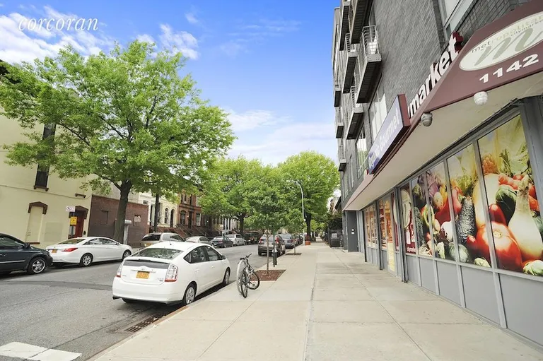 New York City Real Estate | View 85 Monroe Street | Beautiful tree-lined street with grocery on the co | View 4