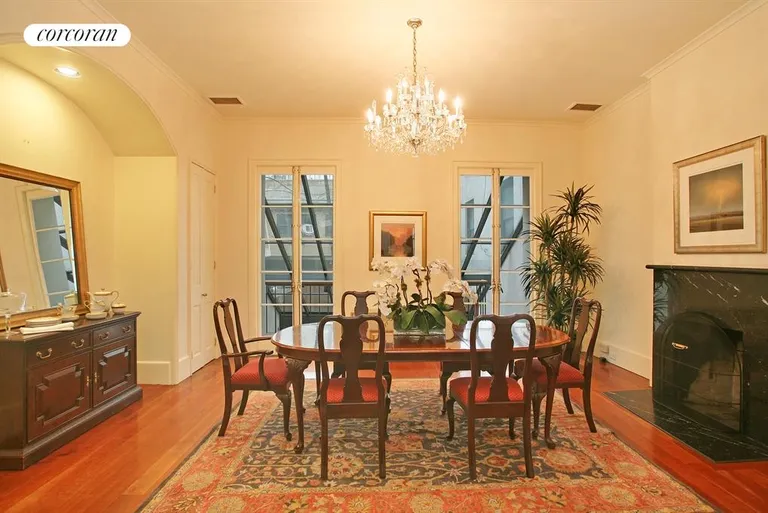 New York City Real Estate | View 406 East 50th Street | Dining Room with WBFPL | View 3