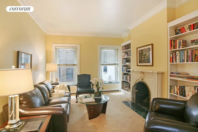 New York City Real Estate | View 406 East 50th Street | Library with WBFPL | View 4