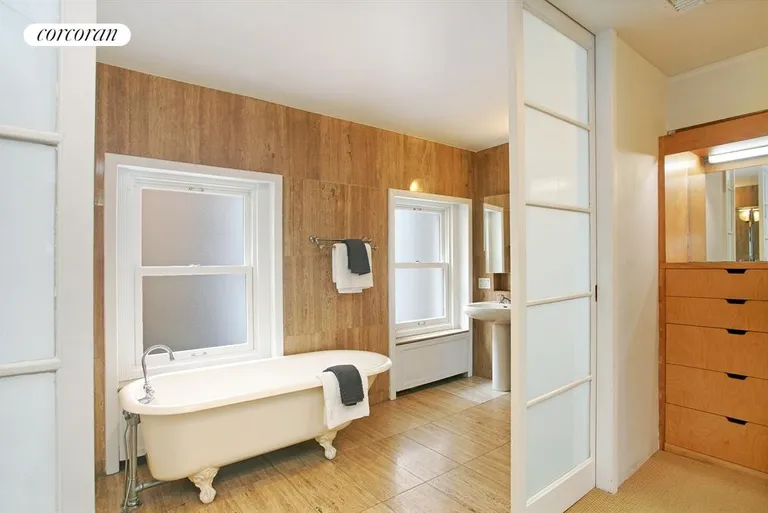 New York City Real Estate | View 406 East 50th Street | Master Bathroom with His and Hers Walk-in Closets | View 6