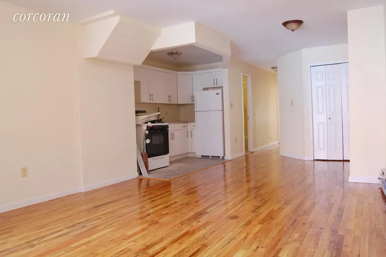 New York City Real Estate | View 227A Malcolm X Boulevard | Middle Floor 3BR Living Room | View 8