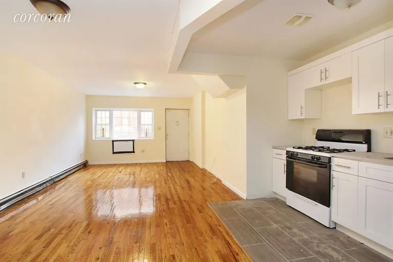 New York City Real Estate | View 227A Malcolm X Boulevard | Middle Floor 3BR Living Room | View 2