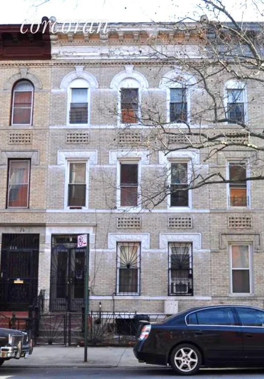 New York City Real Estate | View 512 MacDonough Street | Front facade. Basement has 2 windows. | View 8