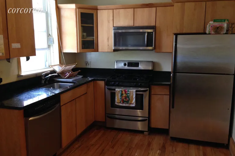 New York City Real Estate | View 512 MacDonough Street | Eat in kitchen on garden level | View 5