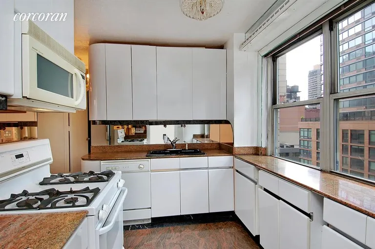 New York City Real Estate | View 300 East 40th Street, 7R | Granite kitchen | View 2