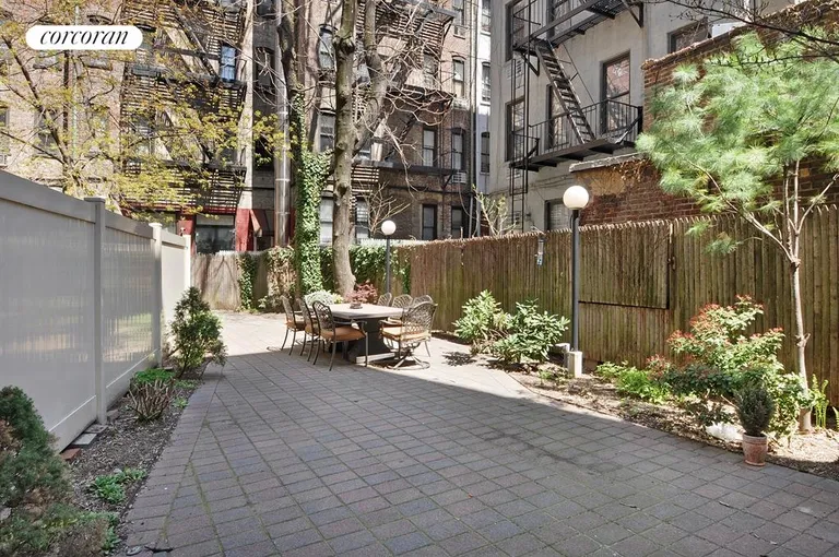New York City Real Estate | View 435 East 76th Street, 3D | Garden with dining table that seats eight! | View 6