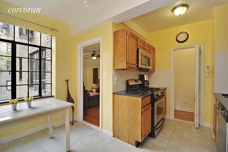 New York City Real Estate | View 211 East 35th Street, 3F | Kitchen- Complete with large windowed dining  area | View 3