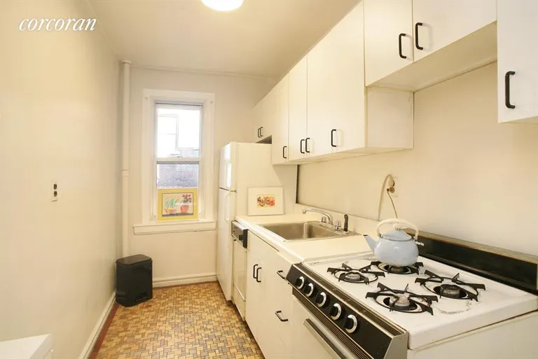 New York City Real Estate | View 135 East 39th Street, 5D | Windowed Kitchen | View 2