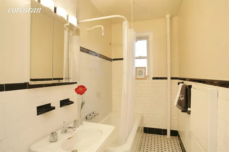 New York City Real Estate | View 135 East 39th Street, 5D | Windowed Bathroom with new and old world charm | View 4