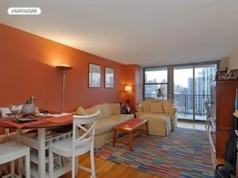 New York City Real Estate | View 301 East 79th Street, 24P | Living Room & Dining Area | View 2