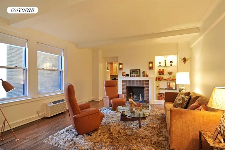 New York City Real Estate | View 315 East 68th Street, 4G | Living Room with fireplace | View 3