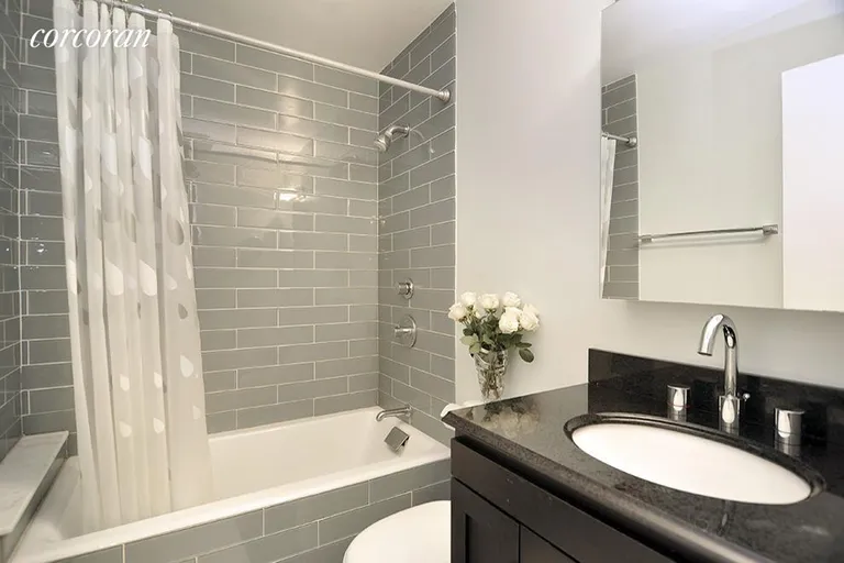 New York City Real Estate | View 275 Greenwich Street, 7C | Great clean and stylish bathroom renovation | View 5