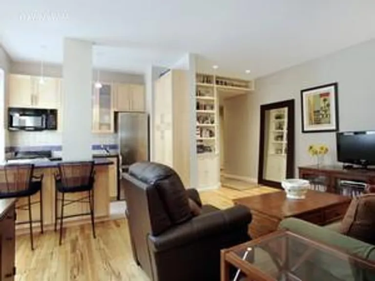 New York City Real Estate | View 214 Riverside Drive, 514 | Open Windowed Kitchen & Entry Way  | View 2