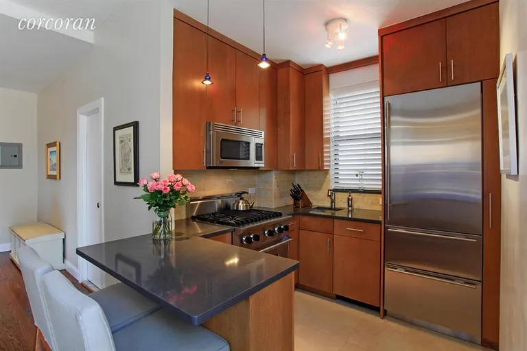 New York City Real Estate | View 11 West 69th Street, PHB | Kitchen with Top-of-the-line Appliances | View 4