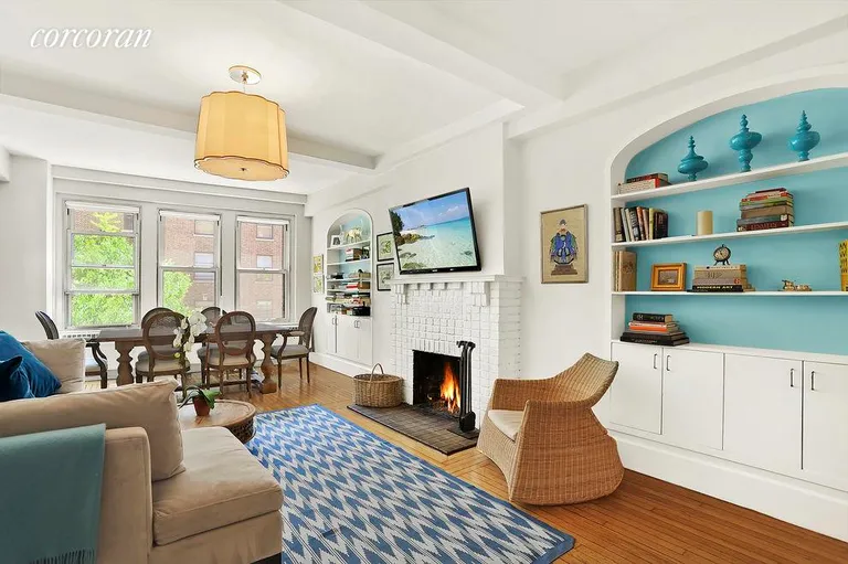 New York City Real Estate | View 21 East 10th Street, 3D | Living/Dining Room with wood-burning fireplace. | View 2