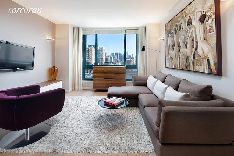New York City Real Estate | View 1 Irving Place, G19D | Living area with incredible light and views | View 2