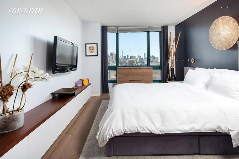 New York City Real Estate | View 1 Irving Place, G19D | Bedroom has built-in work station and cabinetry | View 4
